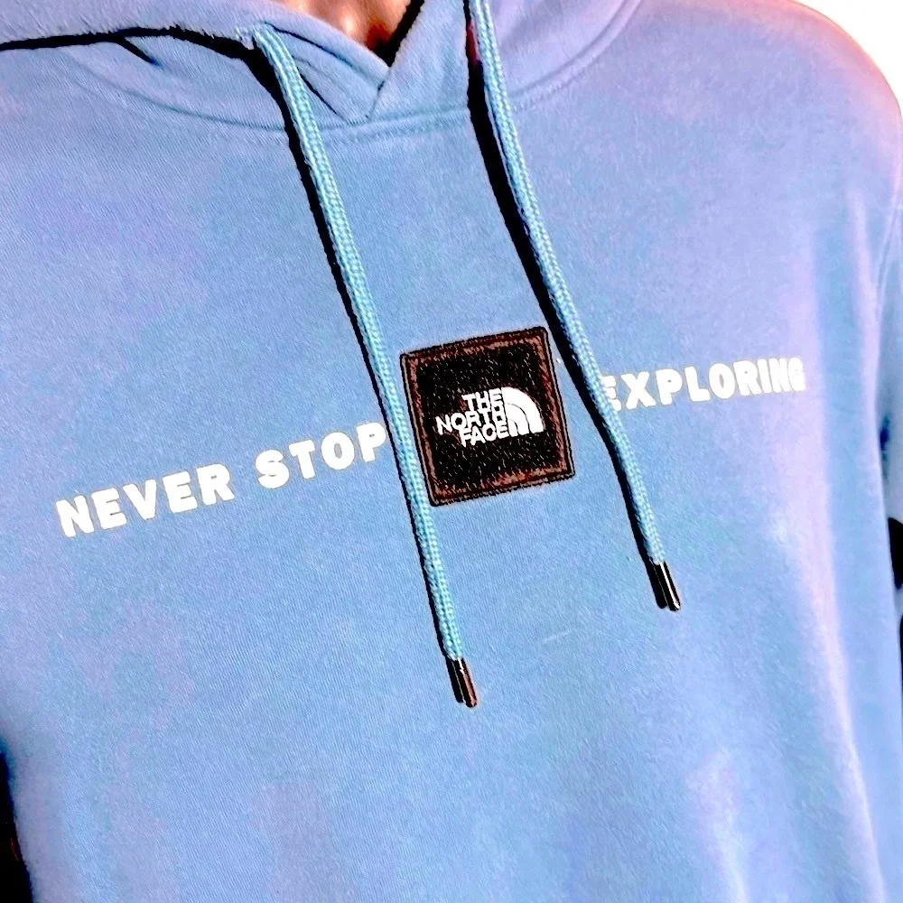 The North Face Men's Blue and Black Hoodie Size Small. Gently Worn.